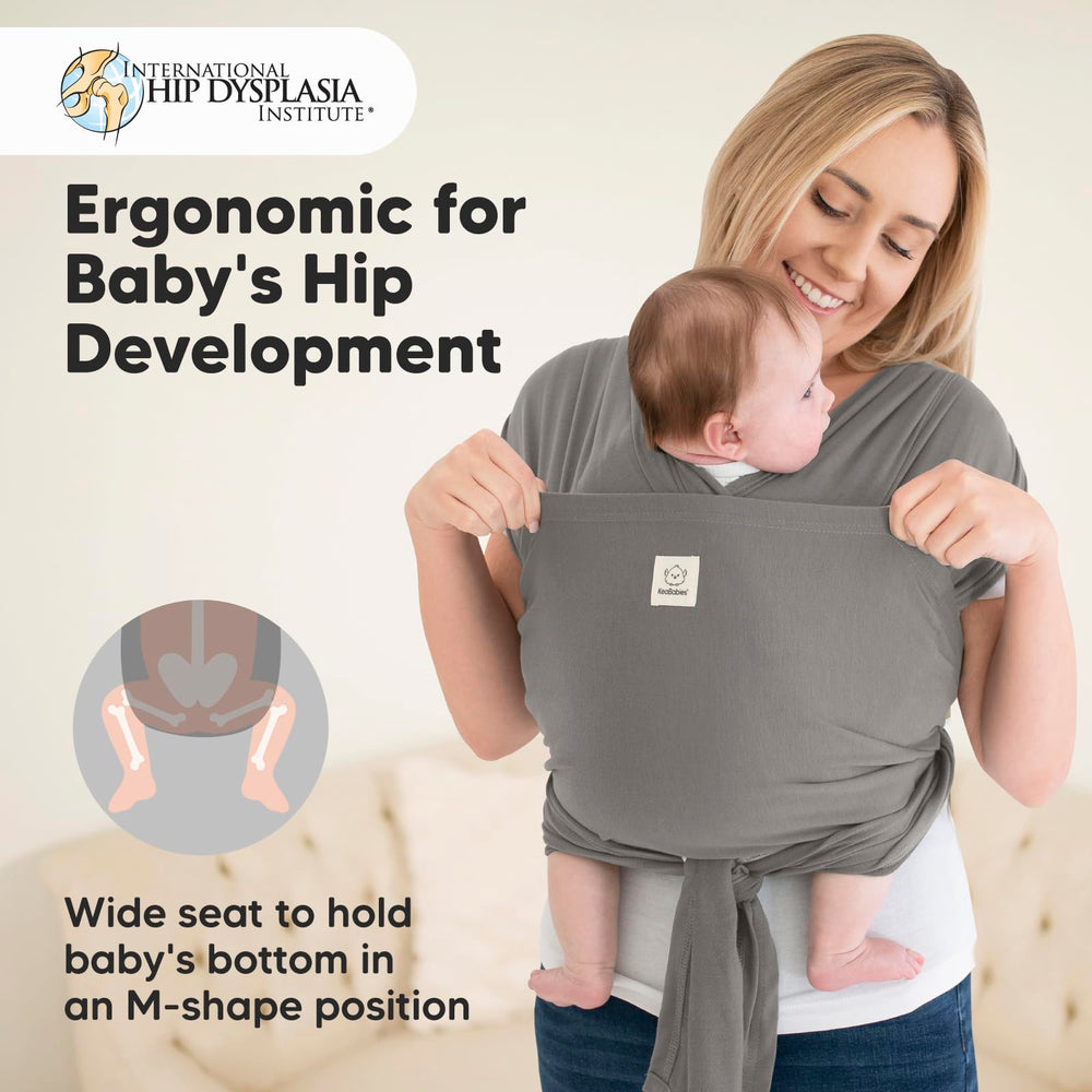 KeaBabies infant carrier graphite on parent illustrates versatile carrying on shoulders.