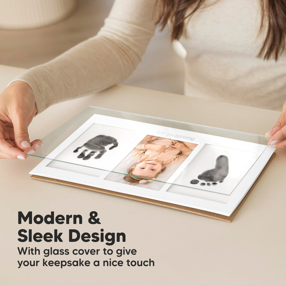 KeaBabies frame closeup displays clear glass and wood frame