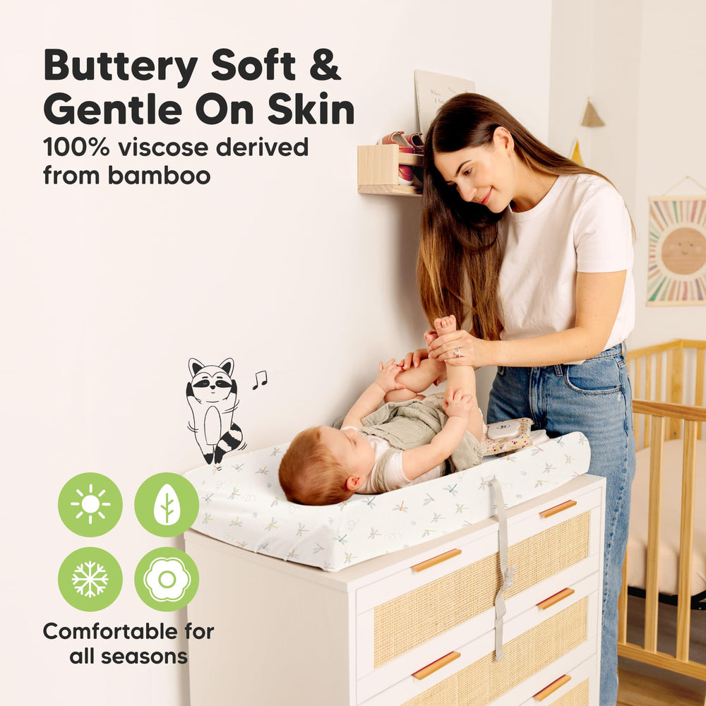KeaBabies Isla changing pad cover with buckle holes supports safety straps.
