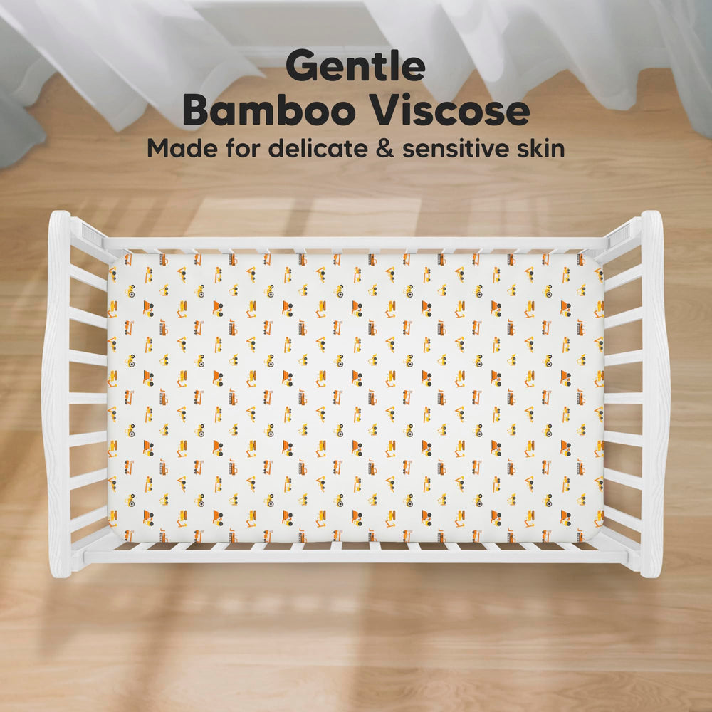 KeaBabies Isla fitted crib sheet on mattress shows snug fit and secure edge
