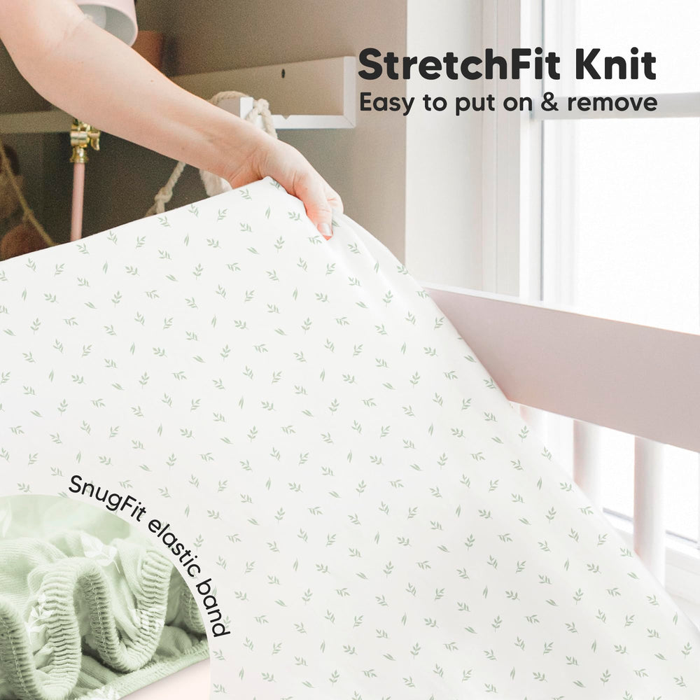 KeaBabies Isla machine-washable crib sheet after a spill