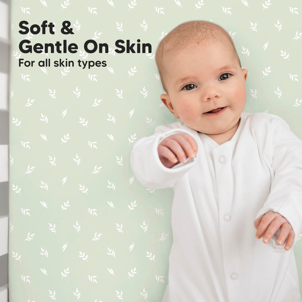 KeaBabies Isla snug-fit stretch demonstrated on crib mattress