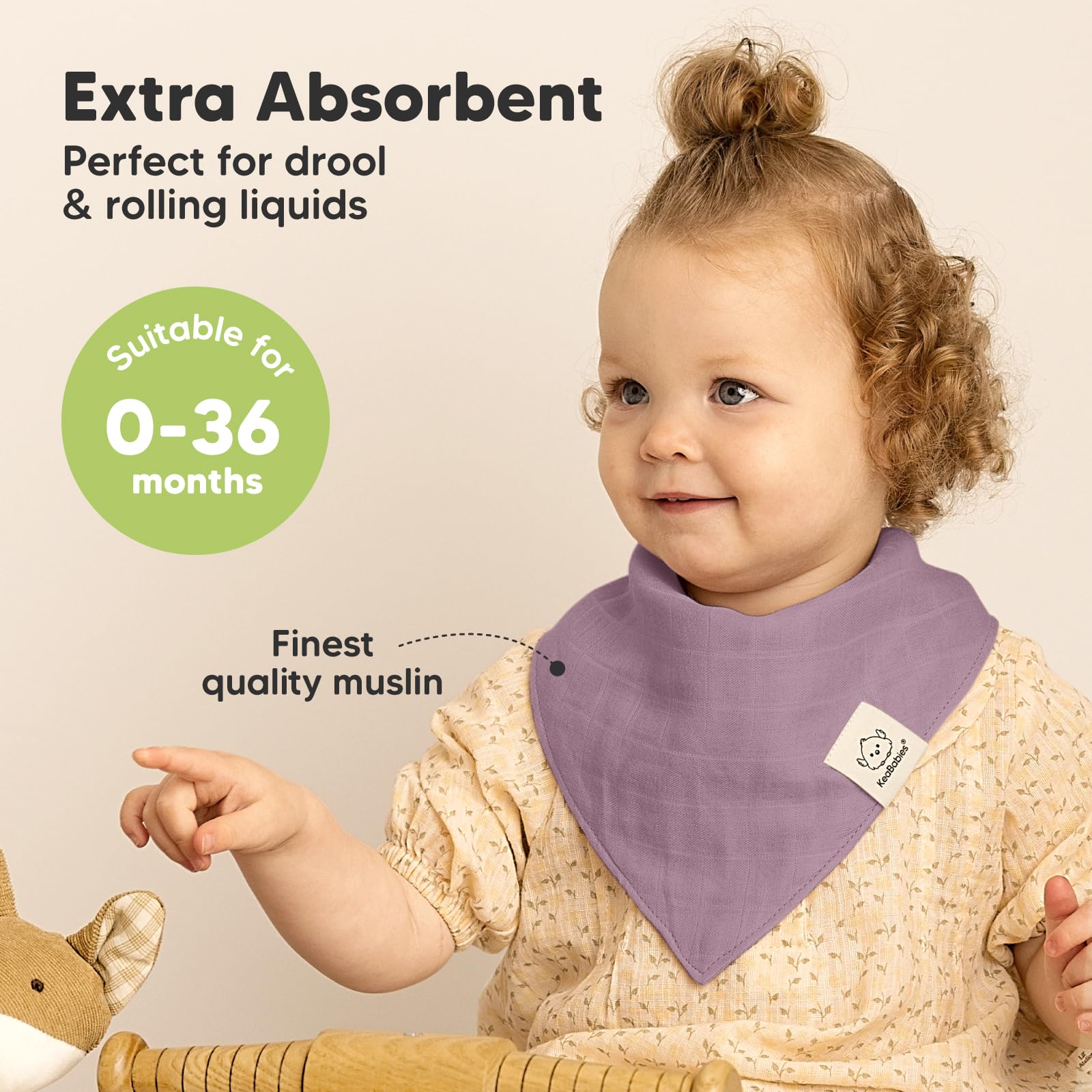 KeaBabies Lumi lavender muslin bib close-up highlights absorbency and quick-dry.