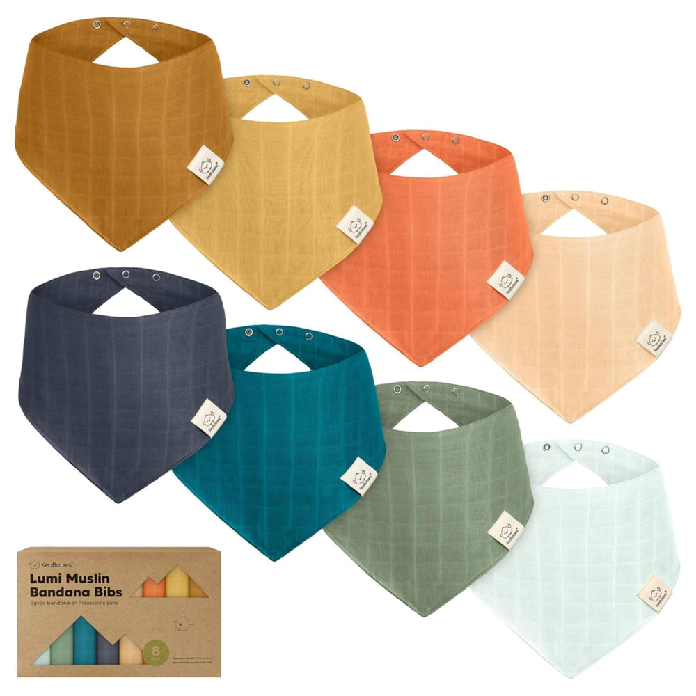 KeaBabies Lumi Muslin Bib triangle style on baby protecting clothes from drool
