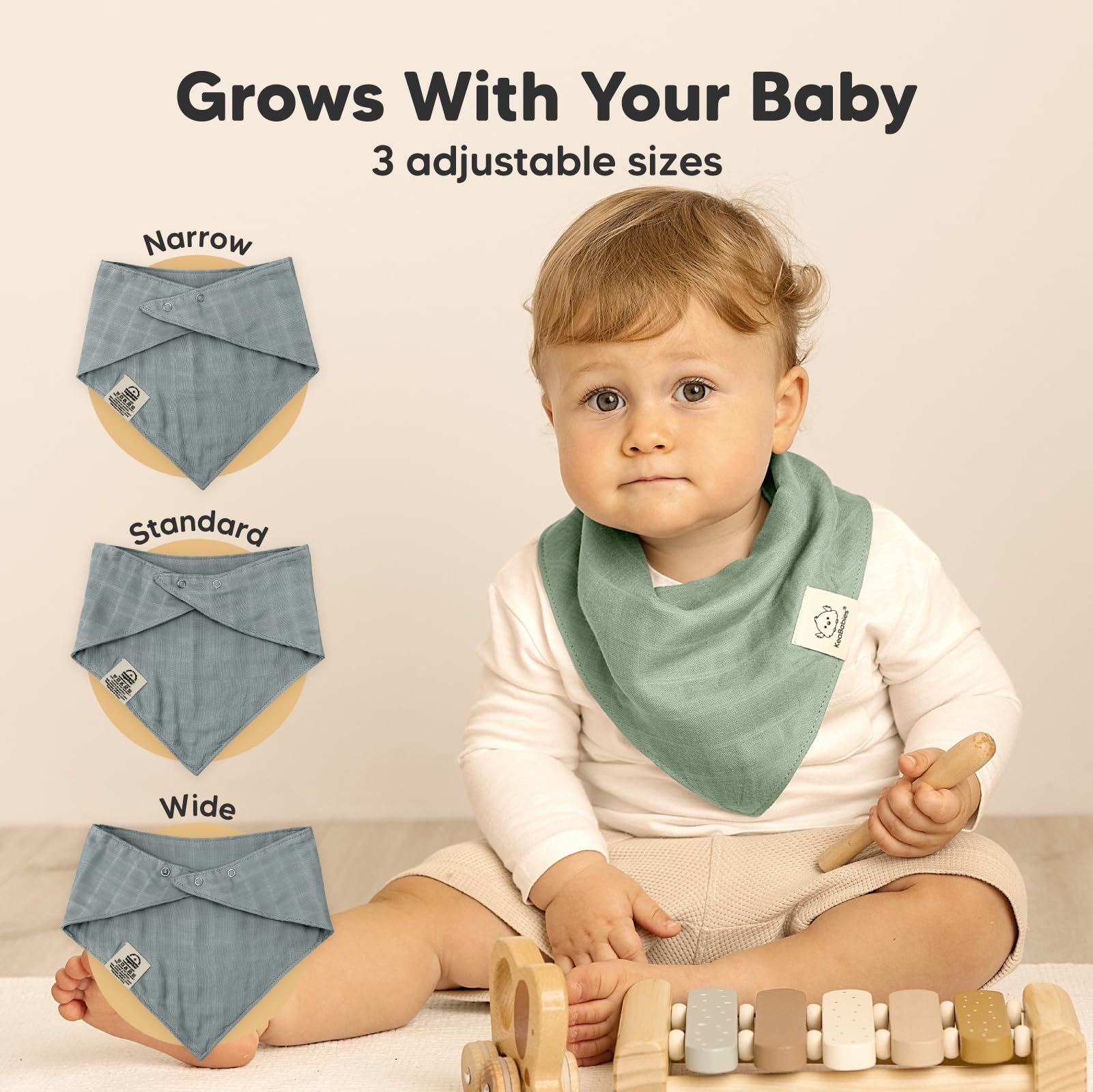 KeaBabies Lumi Muslin Bibs adjustable snaps closeup demonstrates growth from newborn to toddler.