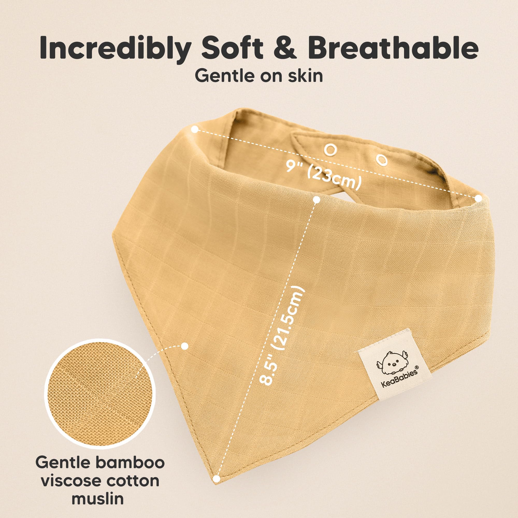 KeaBabies Lumi Muslin Bibs Sahara close-up, emphasizing moisture absorption during drool.
