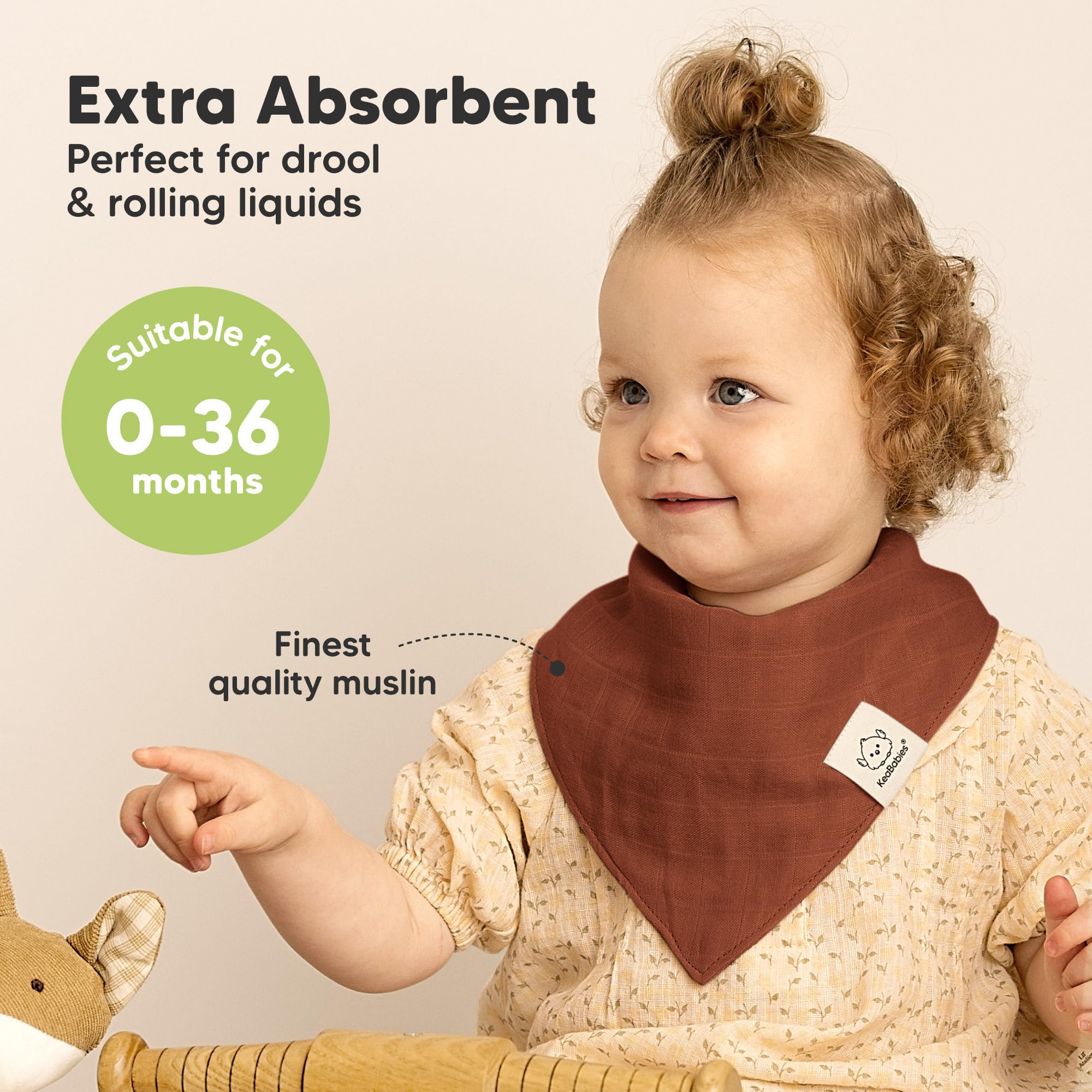 KeaBabies Lumi Muslin Bibs Sahara folded, highlighting ultra-soft fabric and quick-drying feel.