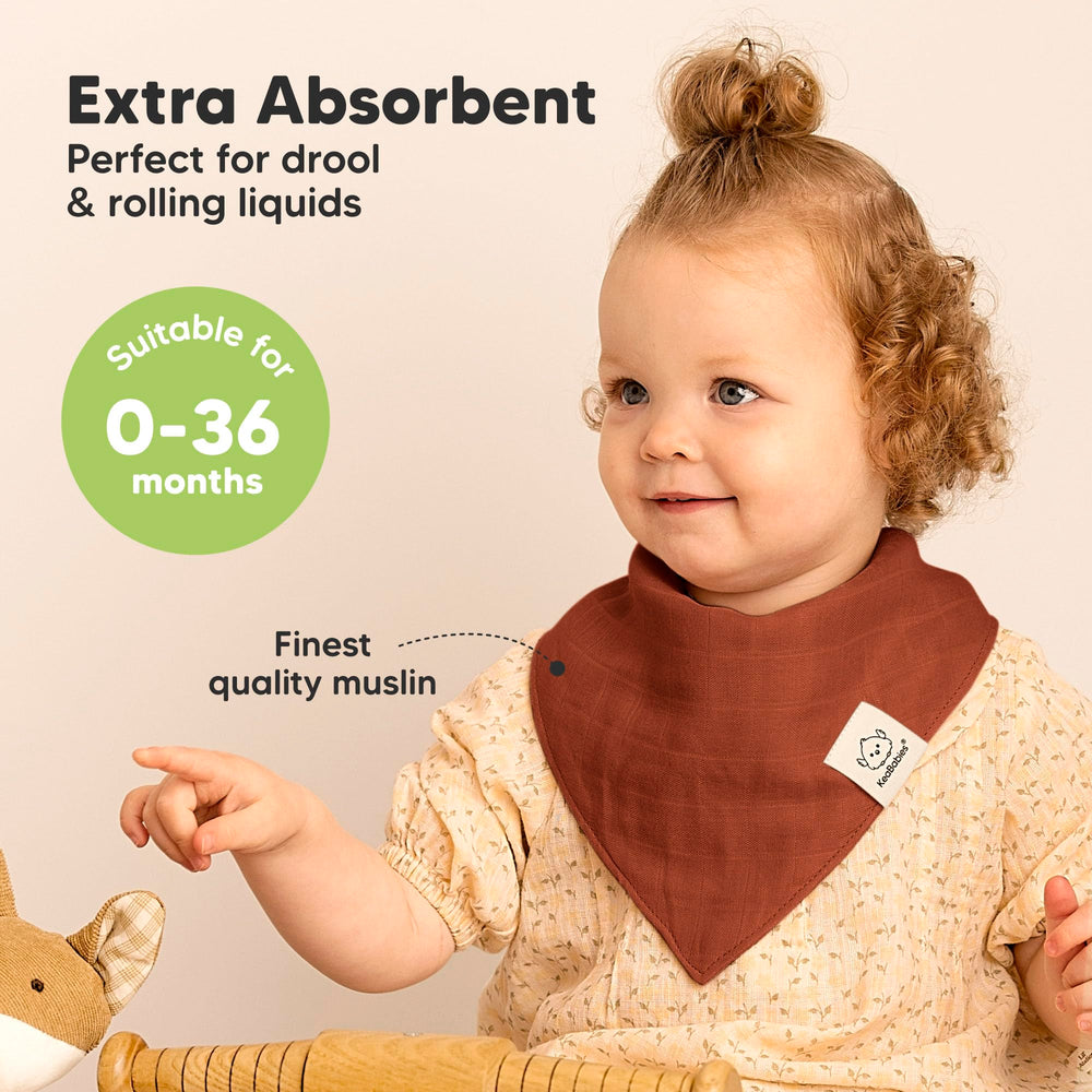 KeaBabies Lumi Muslin Bibs Sahara folded, highlighting ultra-soft fabric and quick-drying feel.