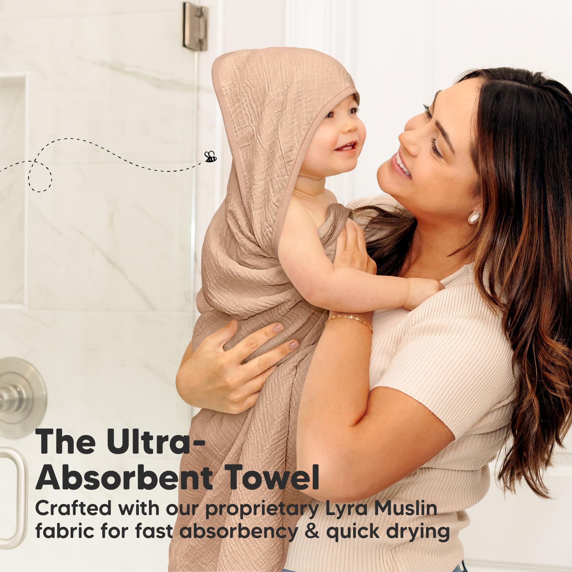 KeaBabies Lyra Muslin Hooded Towel four-layer absorbency for quick drying.