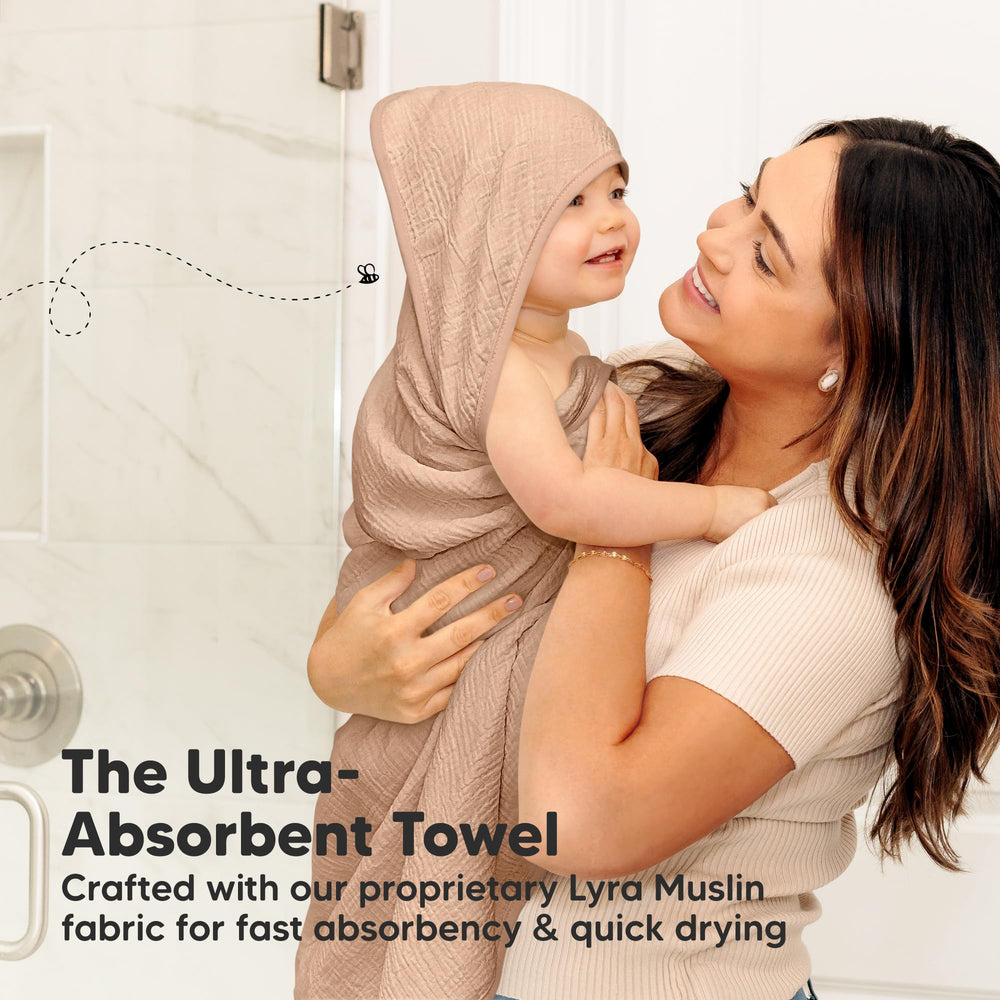 KeaBabies Lyra Muslin Hooded Towel four-layer absorbency for quick drying.