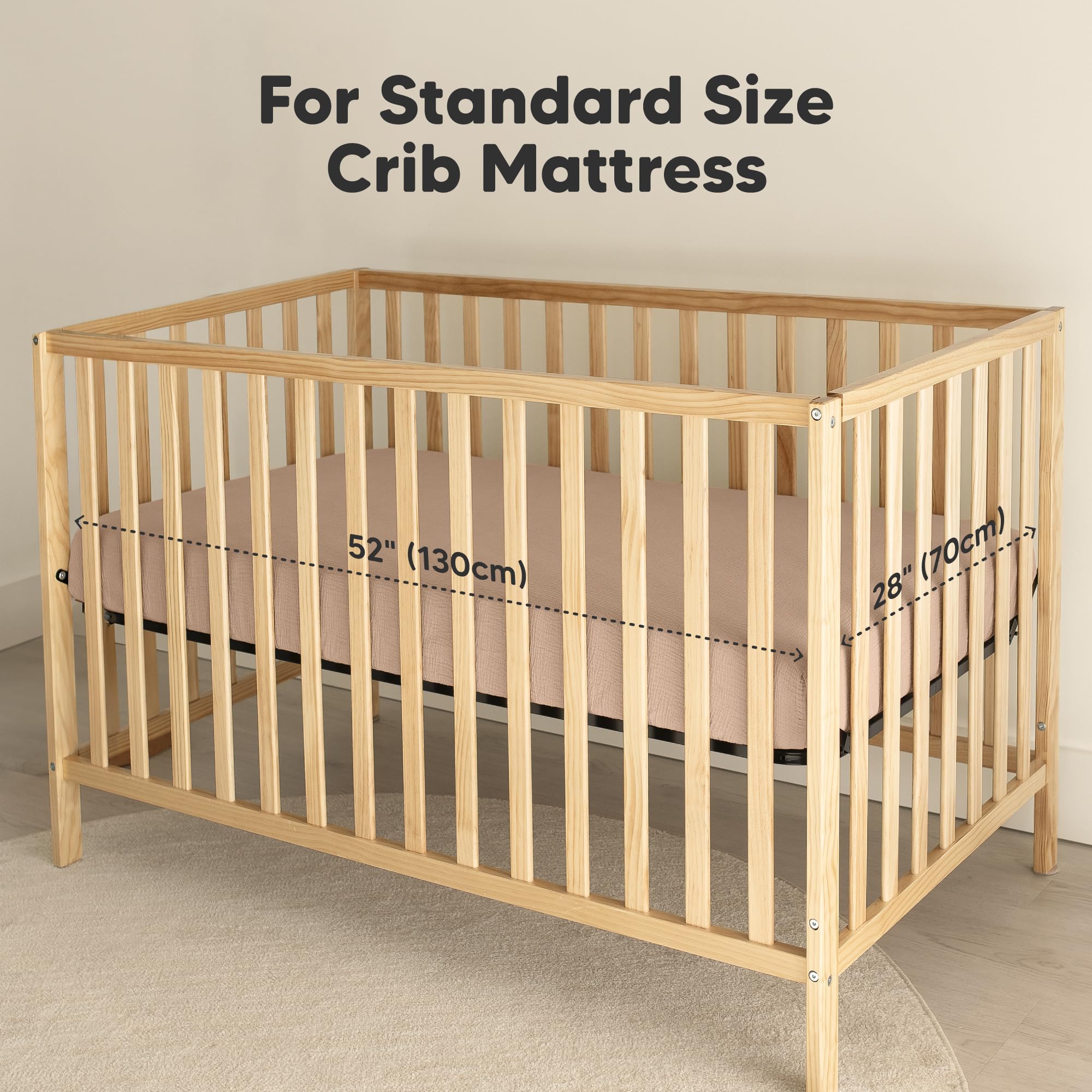 KeaBabies Lyra muslin crib sheets on a standard crib mattress