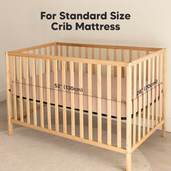 KeaBabies Lyra muslin crib sheets on a standard crib mattress