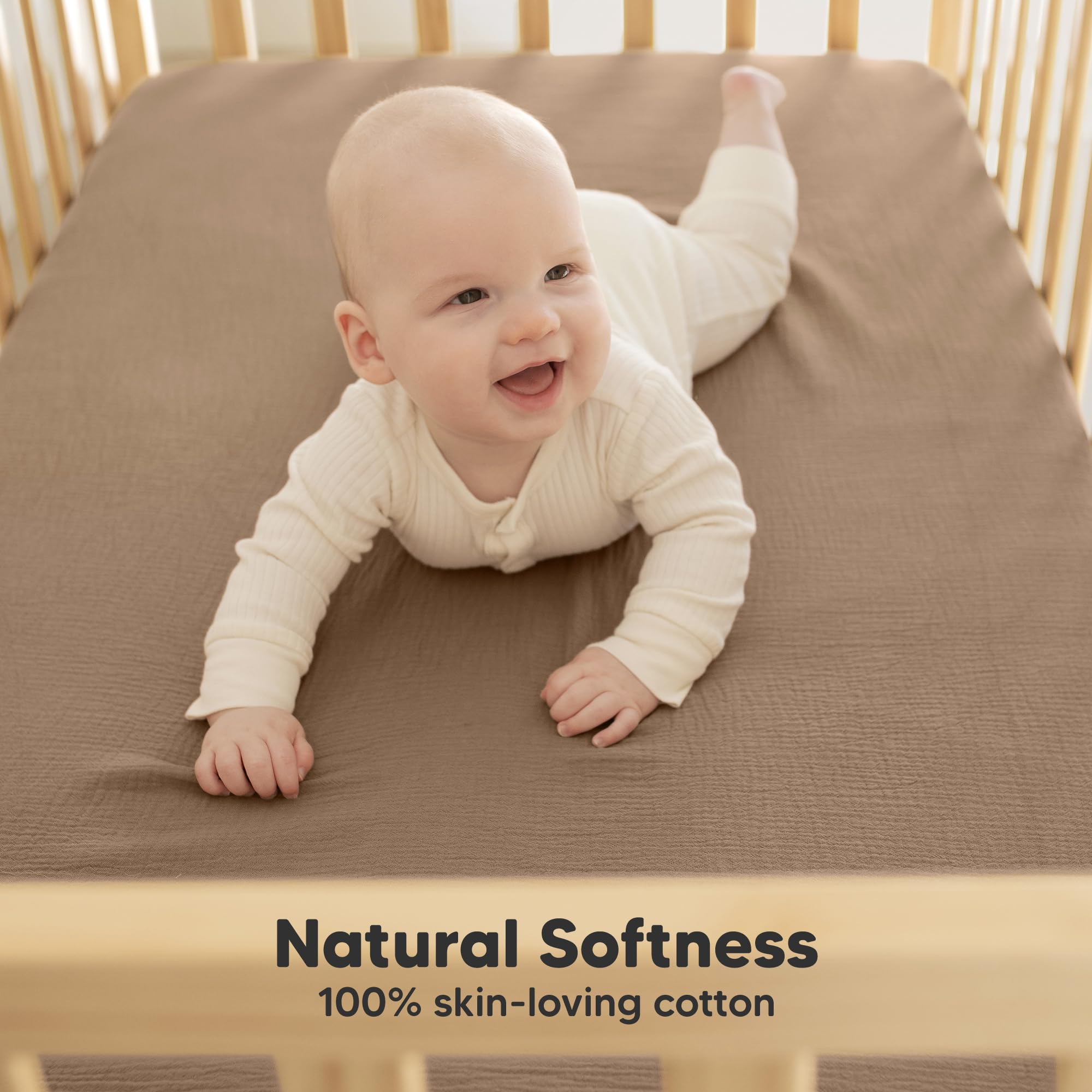KeaBabies Lyra crib sheets with snugfit elastic securing a snug fit