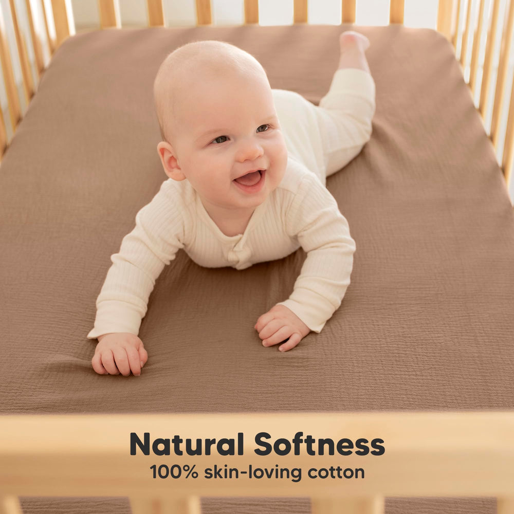 KeaBabies Lyra crib sheets with snugfit elastic securing a snug fit
