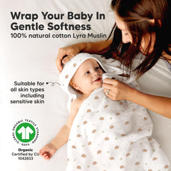 KeaBabies Lyra hooded towel wrapped around baby, highlighting gentle warmth after bath