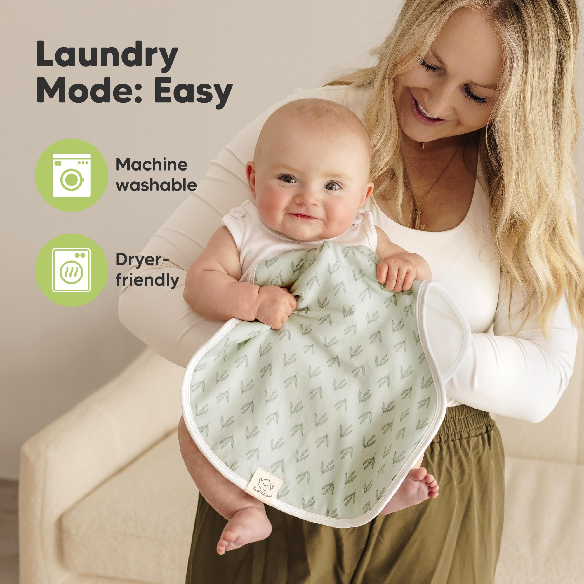 KeaBabies burp cloths on a washing basket emphasizing machine washable care