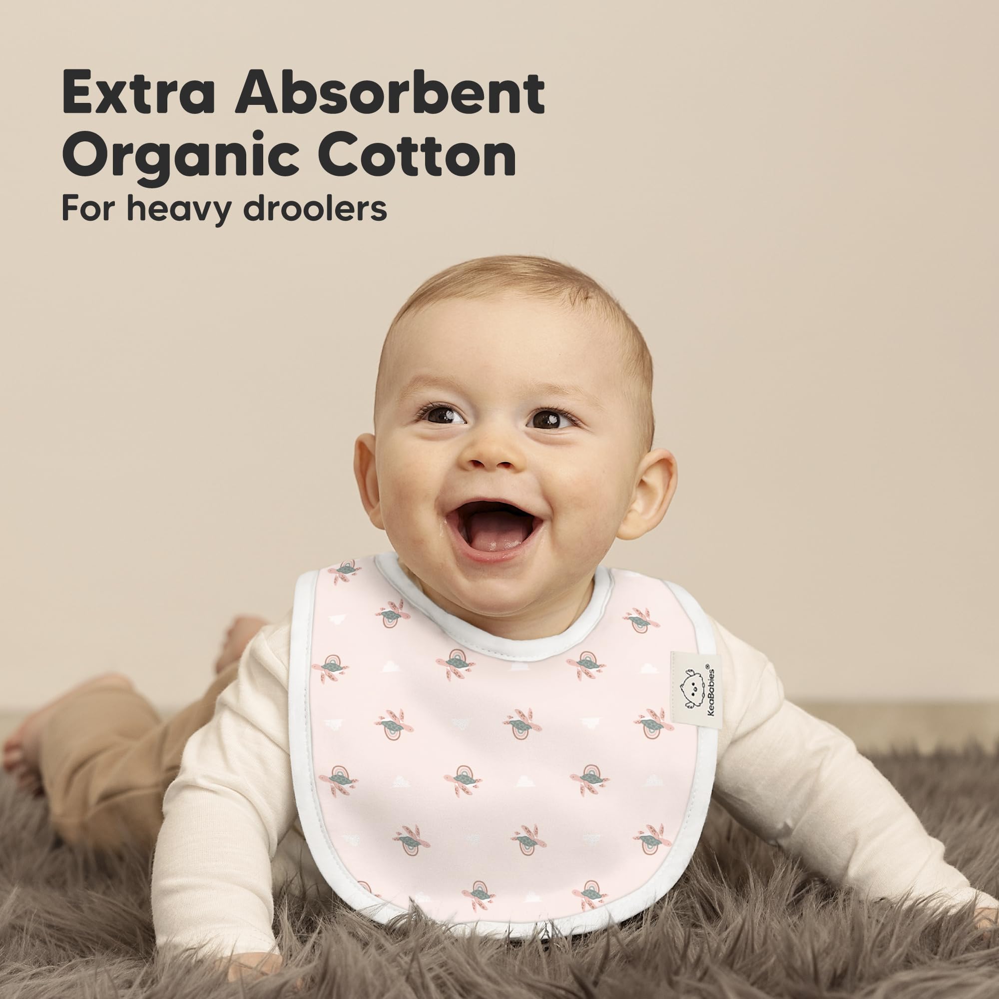 KeaBabies Marine Muse bib full torso coverage demonstrated on chest