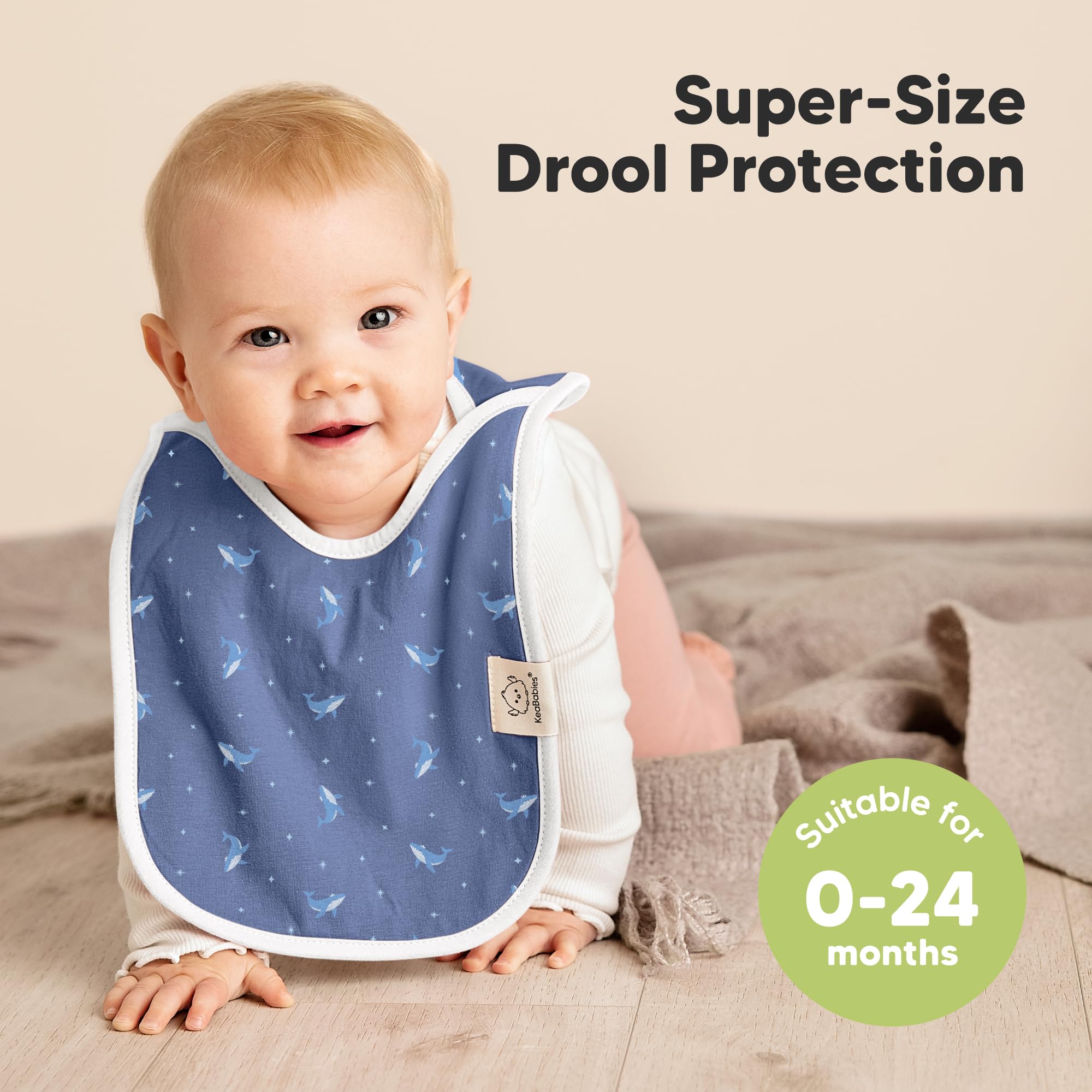 KeaBabies Marine Muse bib worn on baby for drool protection during the day.