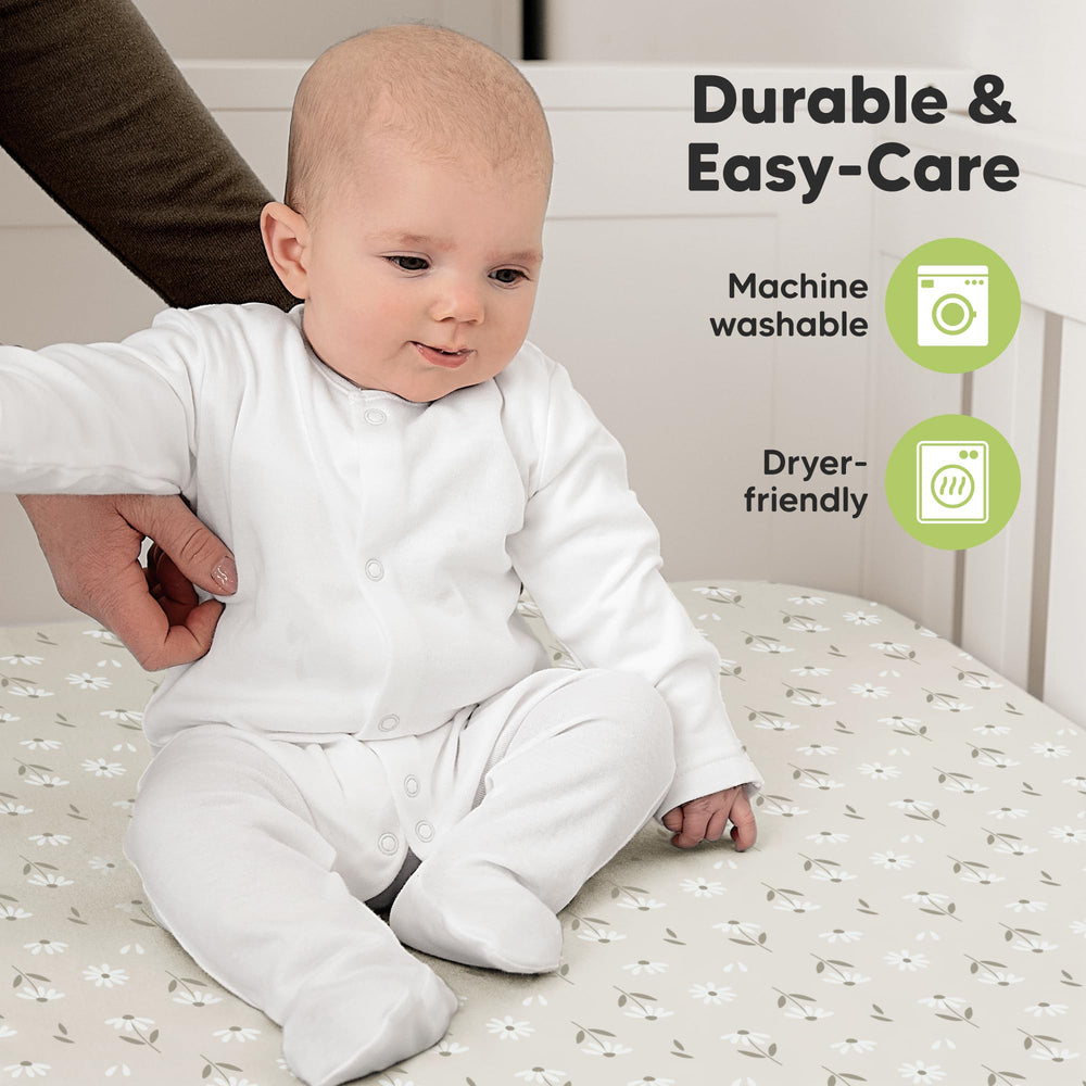 KeaBabies neutral daisy print on crib sheet in nursery