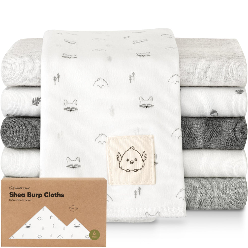 KeaBabies organic burp cloths 6-pack laid out for newborn spit-up cleanup.