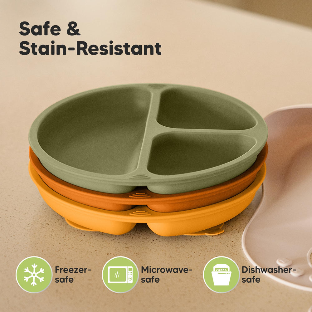 KeaBabies plate on high chair demonstrates secure adhesion during feeding.