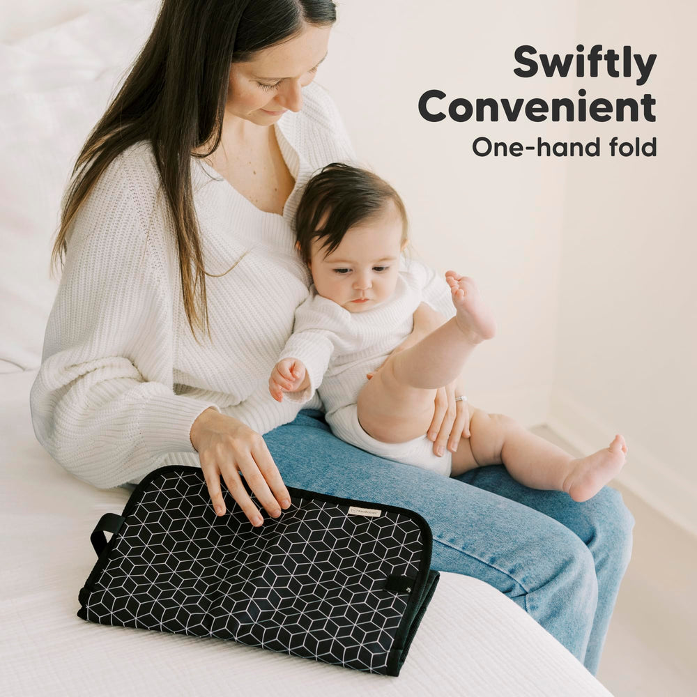KeaBabies pad travel-ready in a diaper bag for on-the-go changes