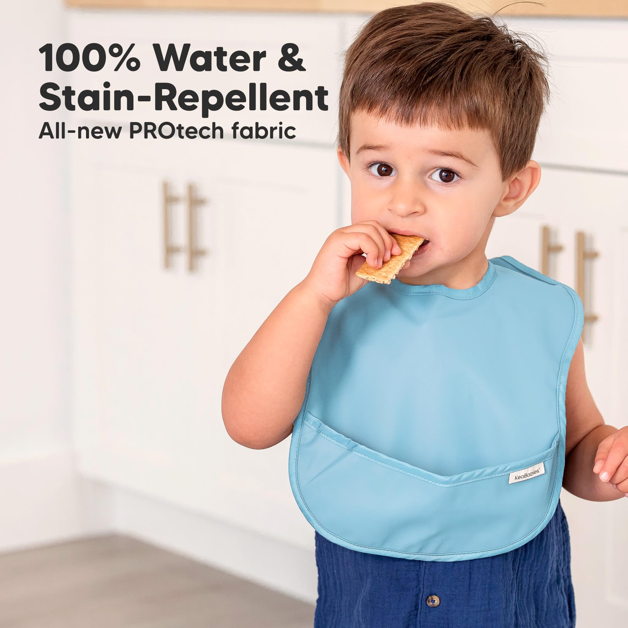 KeaBabies Presto bib covers chest and shoulders to prevent stains.