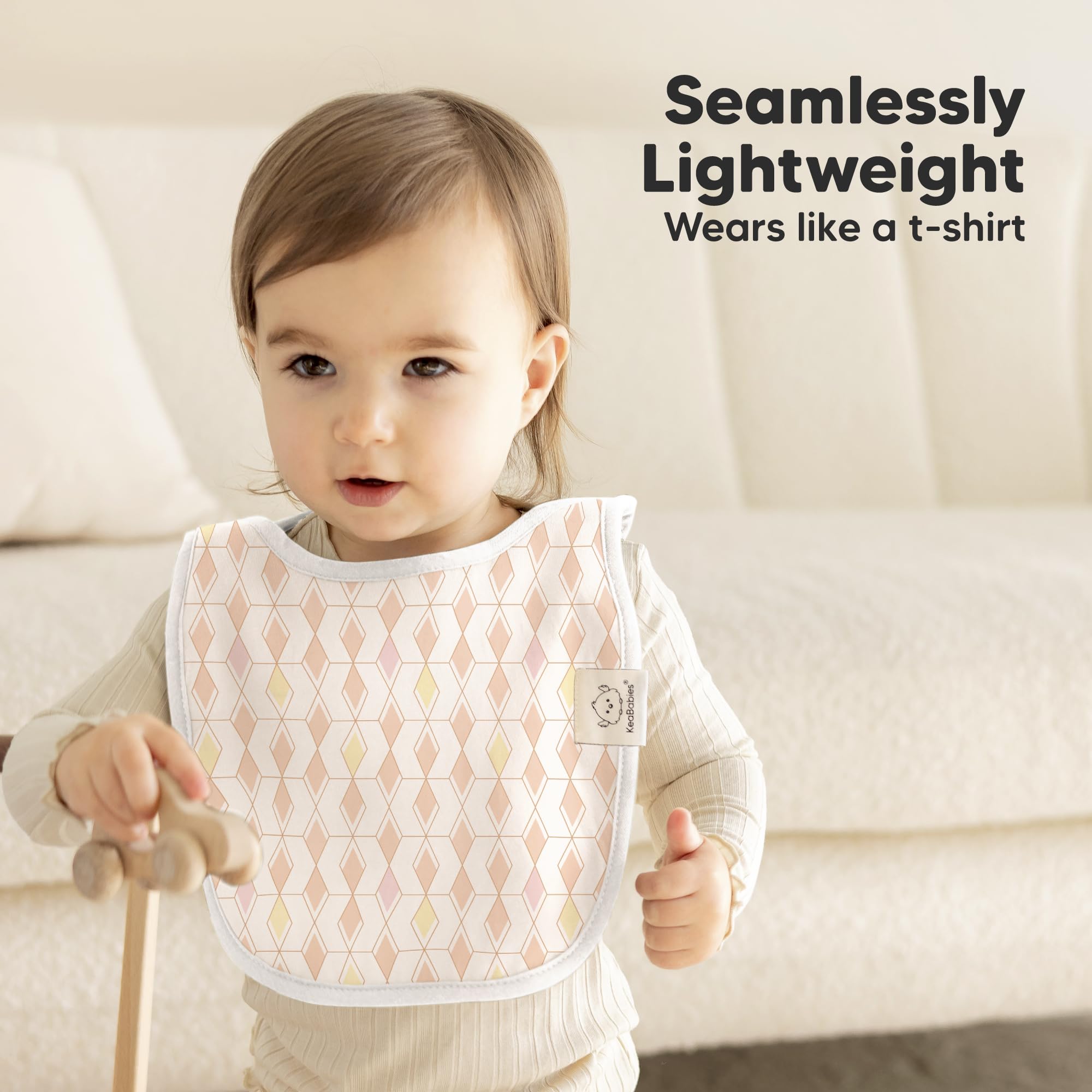 KeaBabies Prism bib in use during drool moment for skin protection