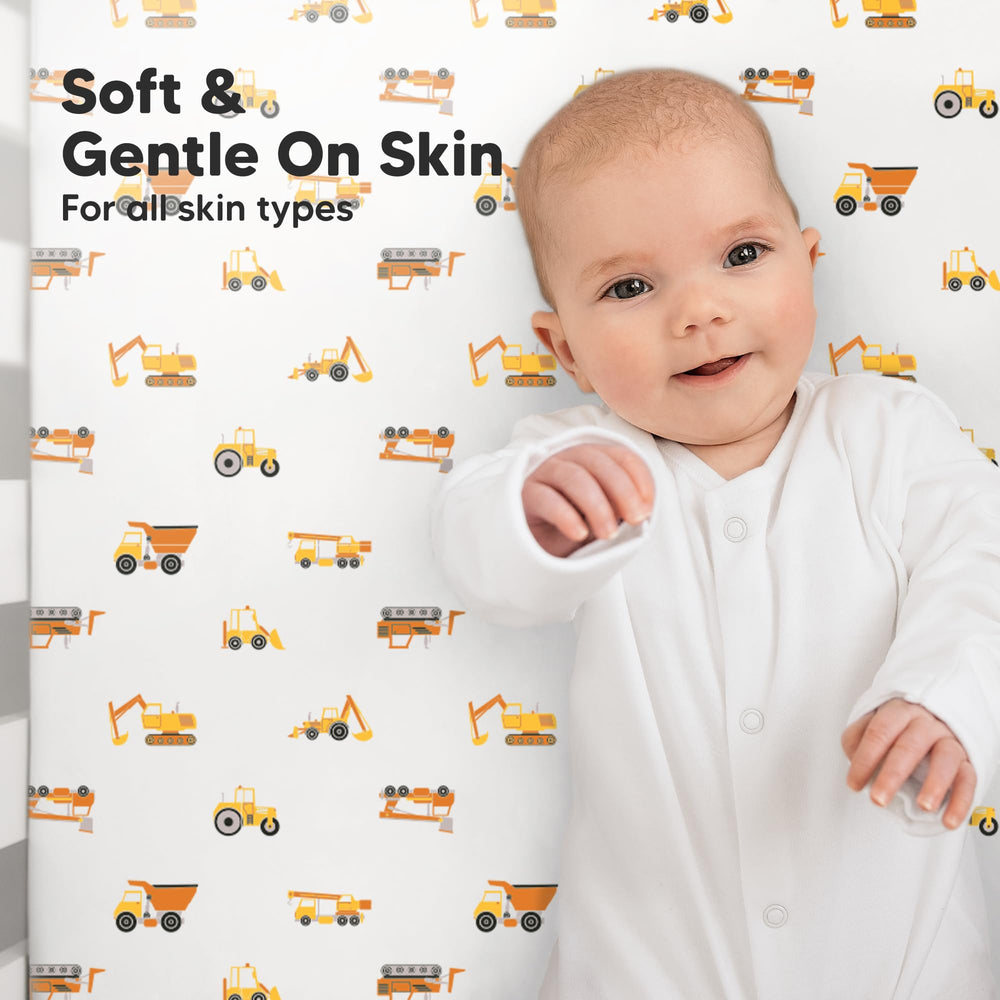 KeaBabies concealed SnugFit elastic band securing crib sheet during sleep.