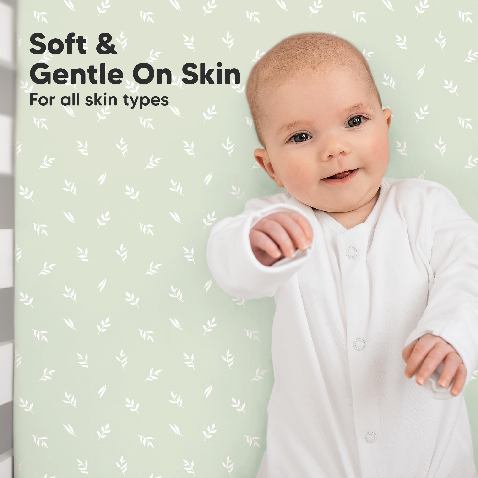 KeaBabies SnugFit Band crib sheet demonstrates concealed elastic for secure placement.