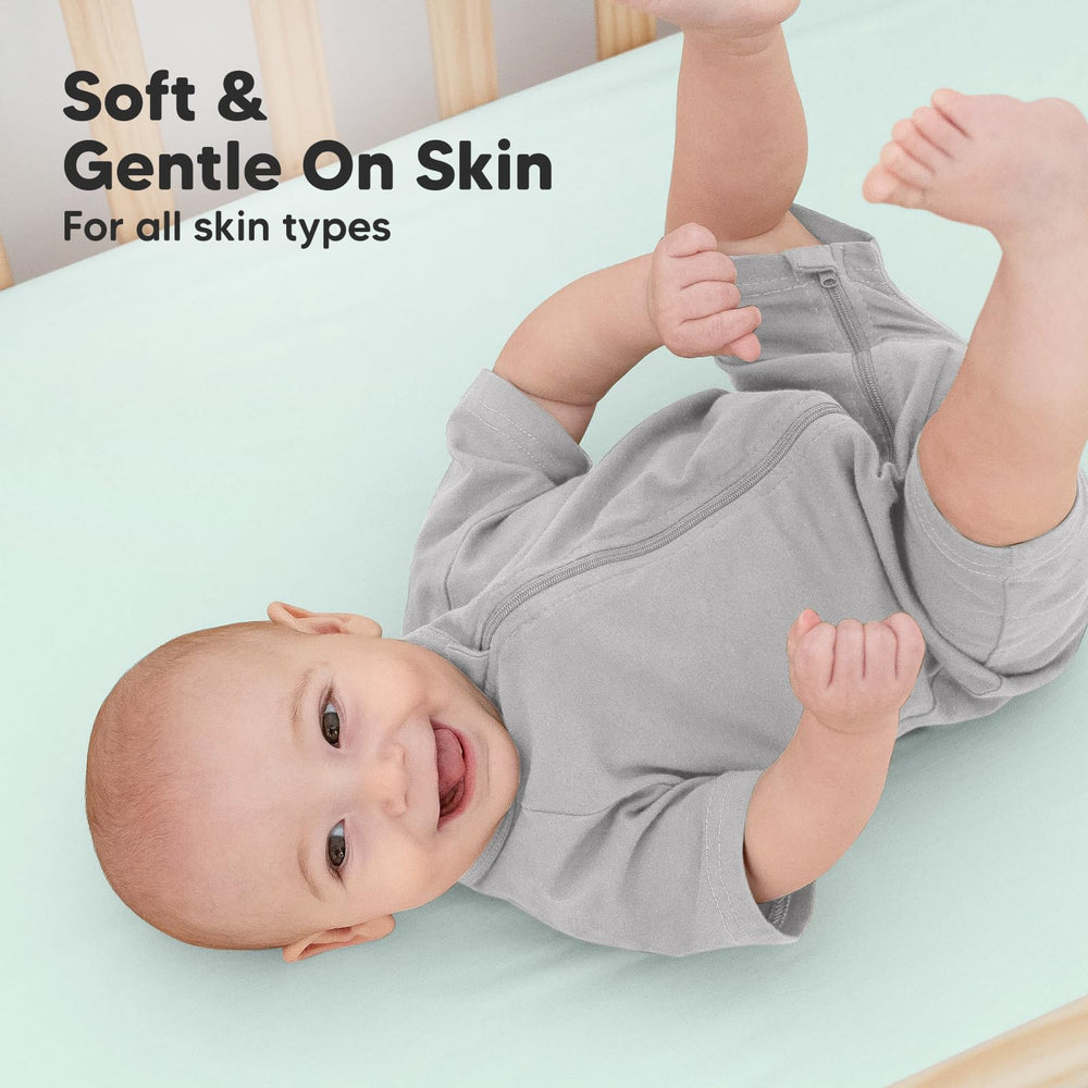 KeaBabies SnugFit elastic band keeps crib sheets securely in place.