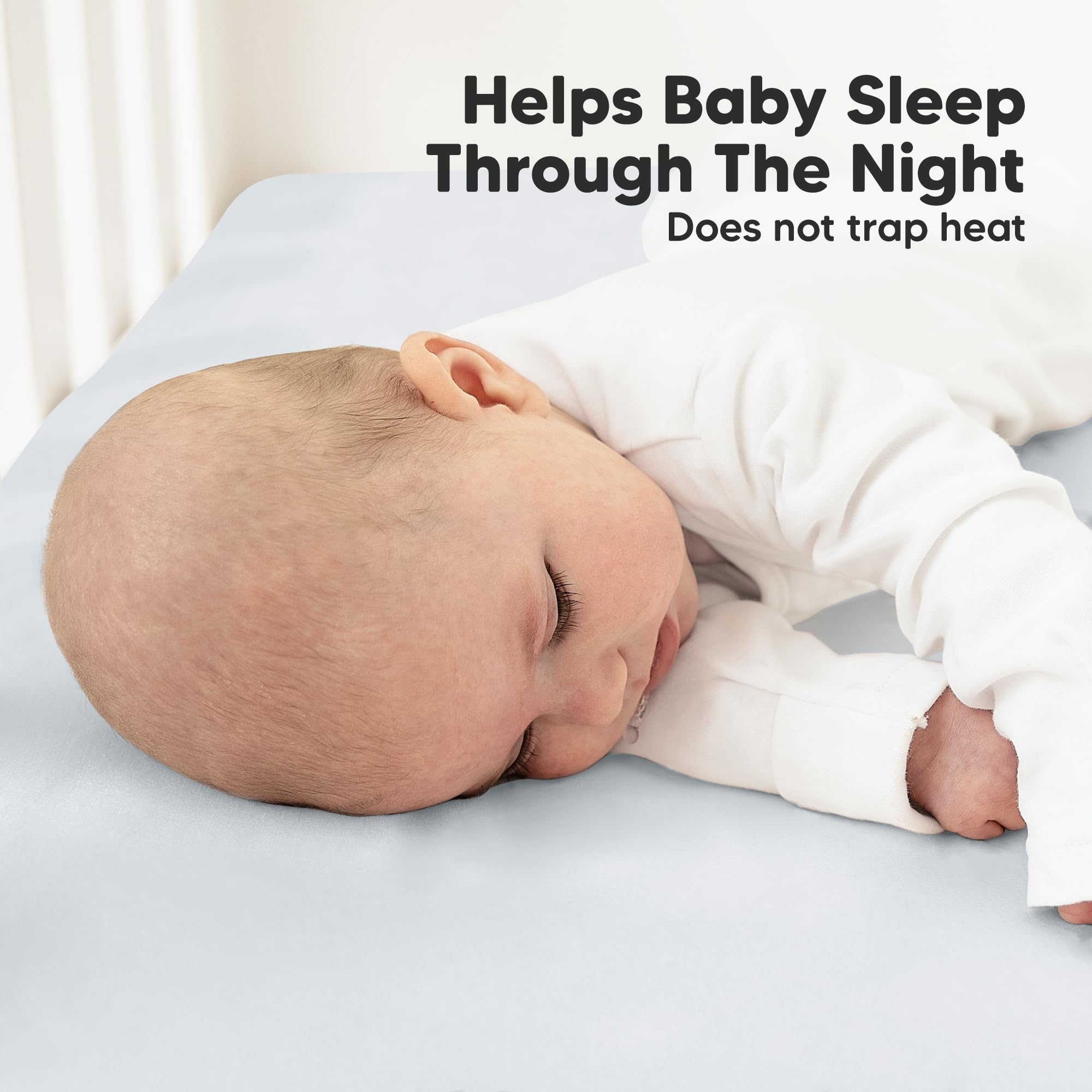 KeaBabies snugfit elastic band hidden under sheet, secure on mattress.