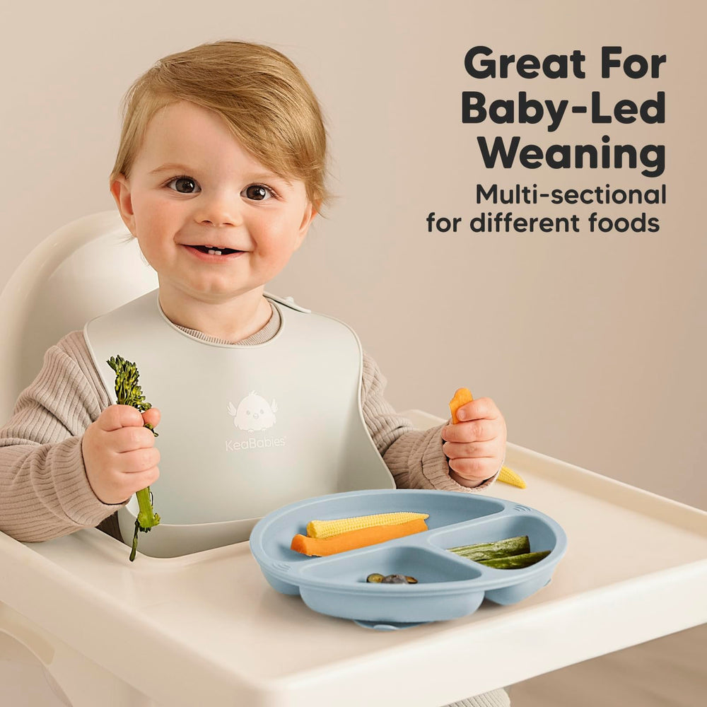 KeaBabies stackable silicone plates with lids for compact kitchen storage.