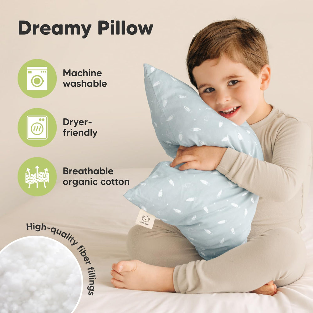 KeaBabies toddler pillows stacked on a bed demonstrating size and comfort