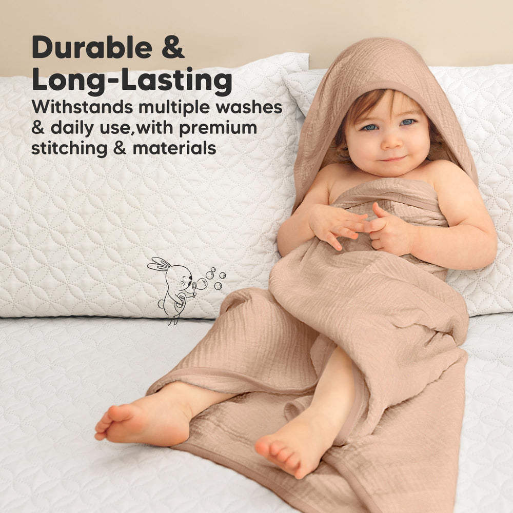 KeaBabies Lyra Hooded Towel on toddler, cozy wrap for post-bath warmth.