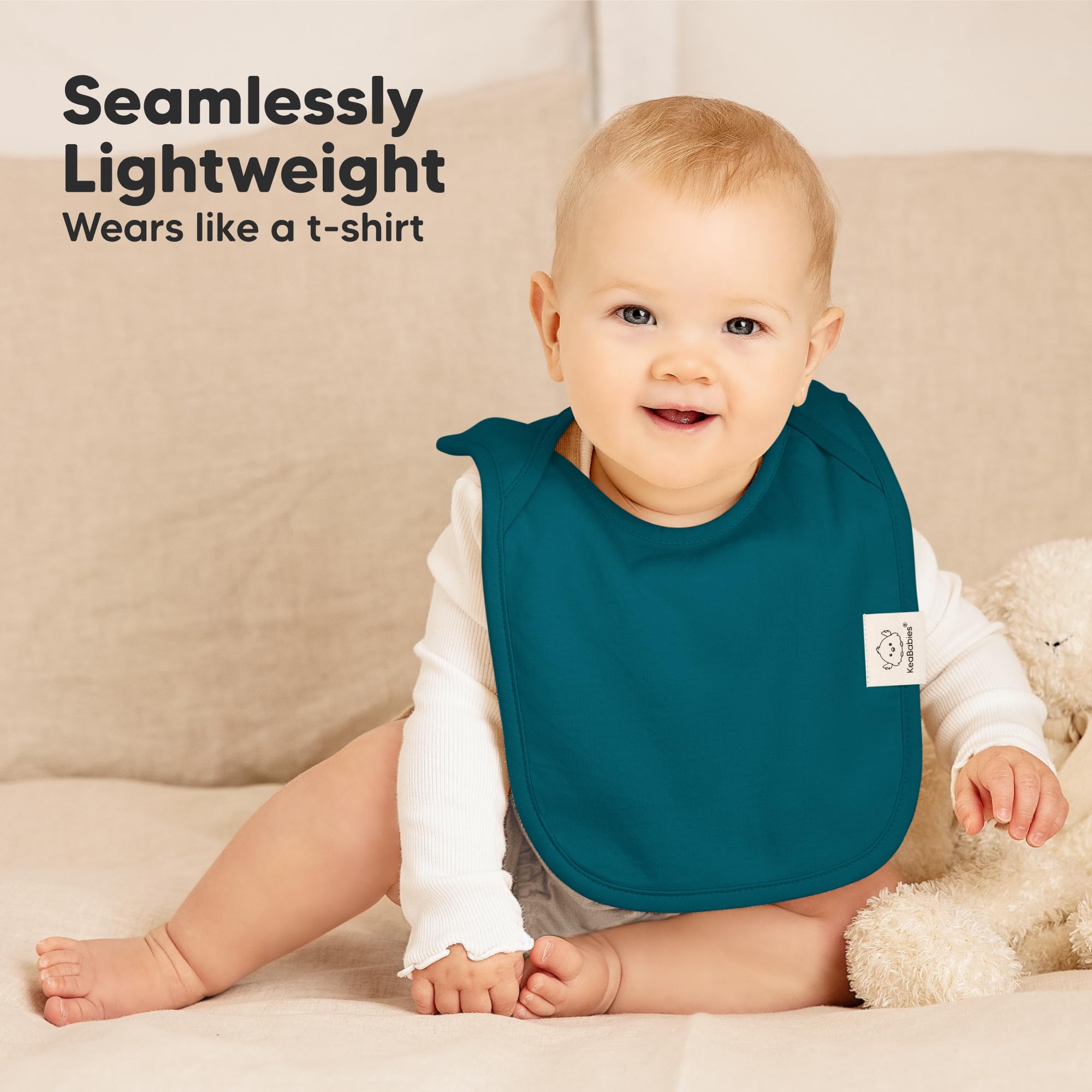 KeaBabies large torso coverage demonstrated for mess protection during meals.