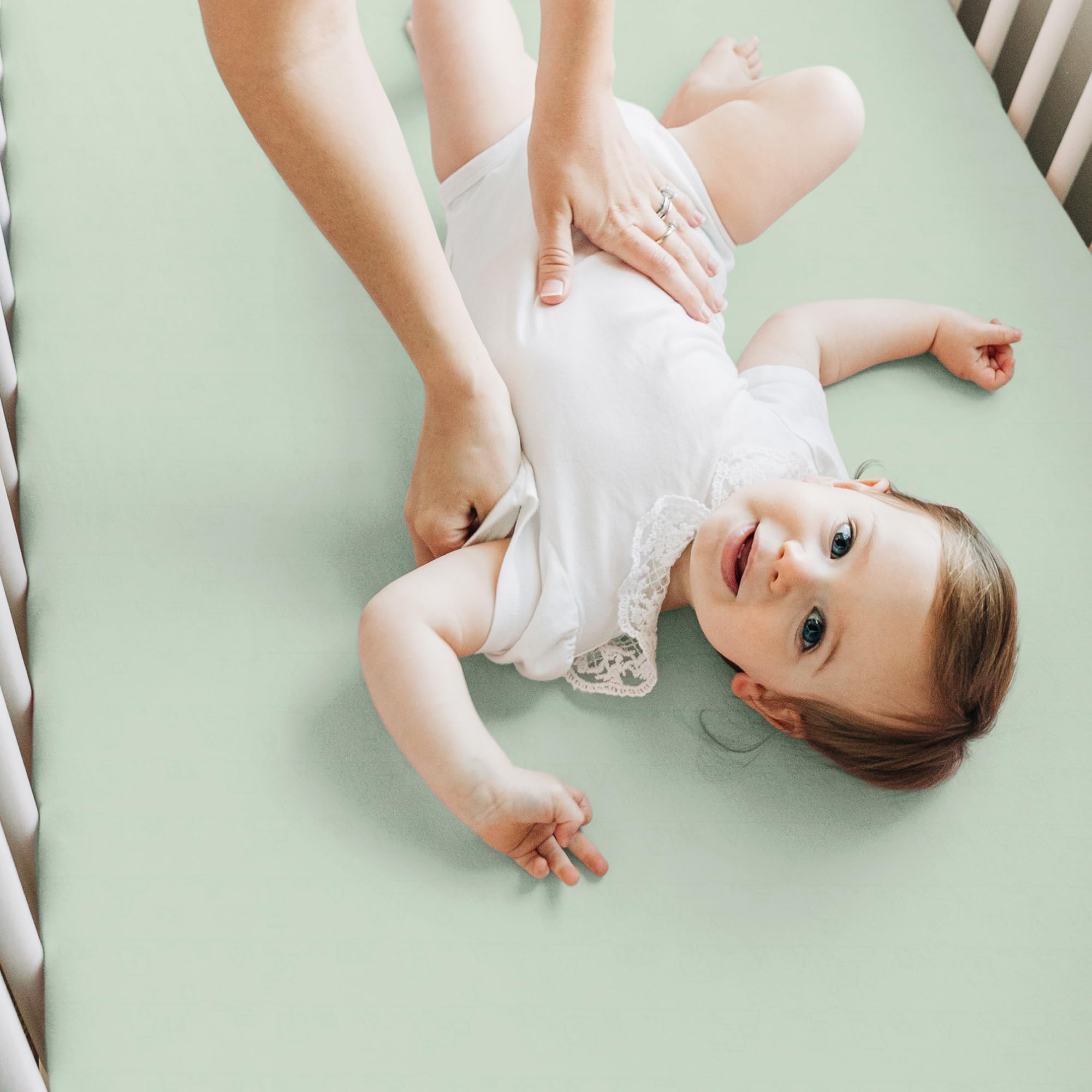 Two-pack KeaBabies nursery bedding essentials on crib