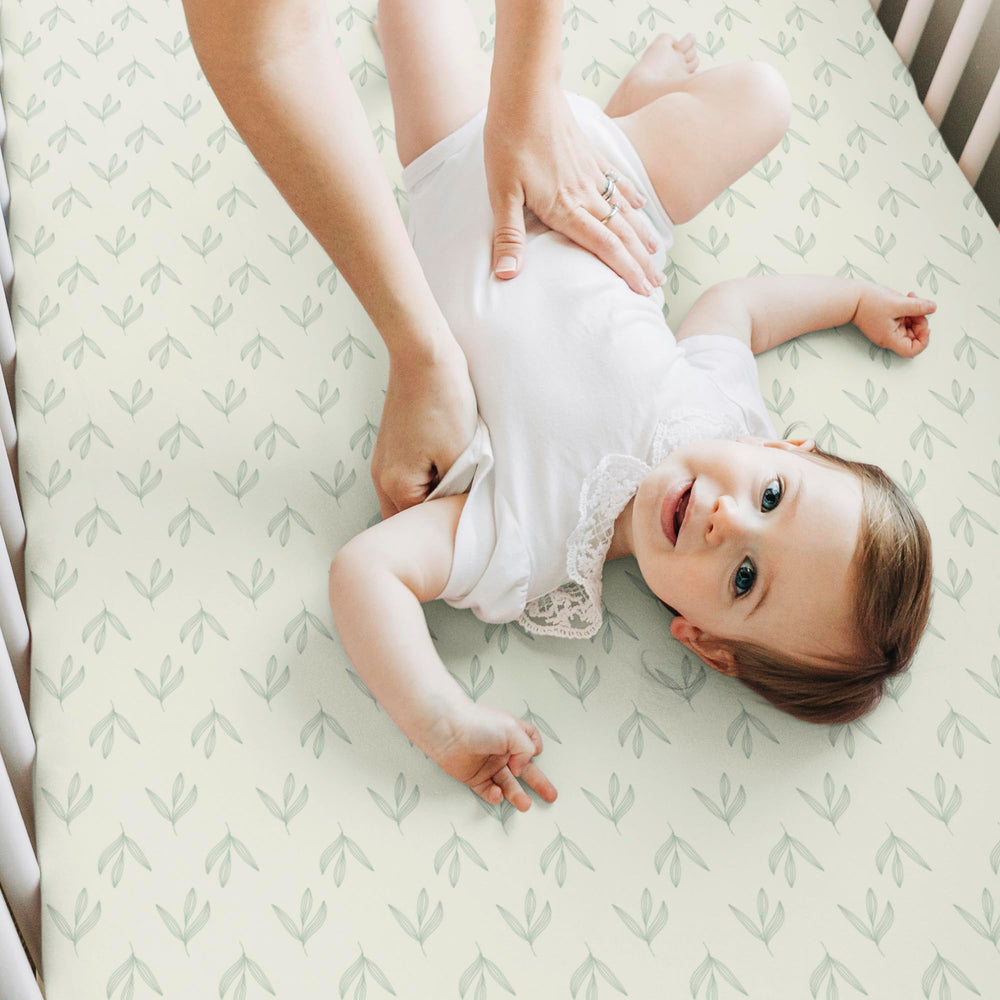 KeaBabies two-pack bedding in cozy crib scene illustrating calming design for baby sleep.