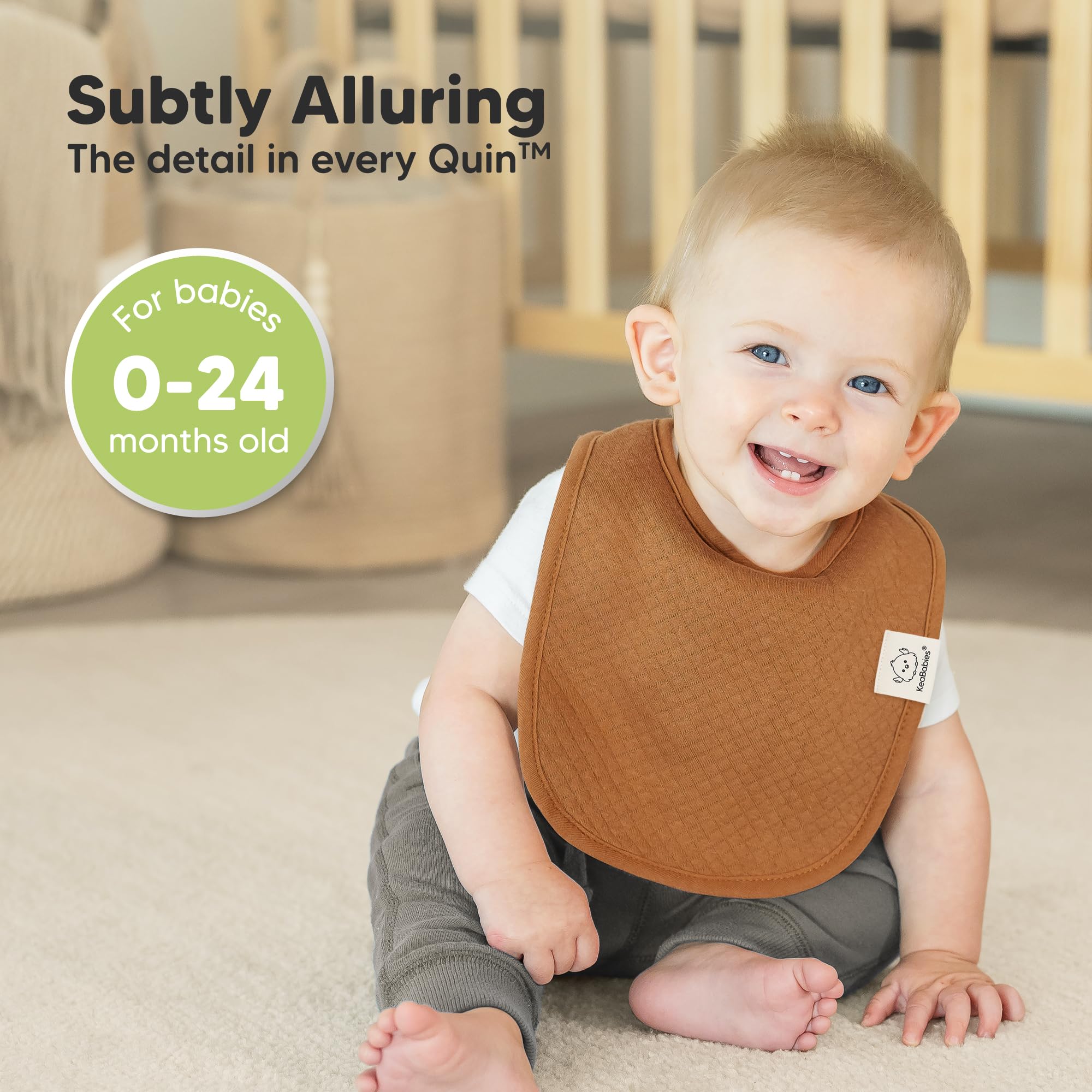 KeaBabies Urban Quin bib pattern closeup shows versatile gender-neutral style.