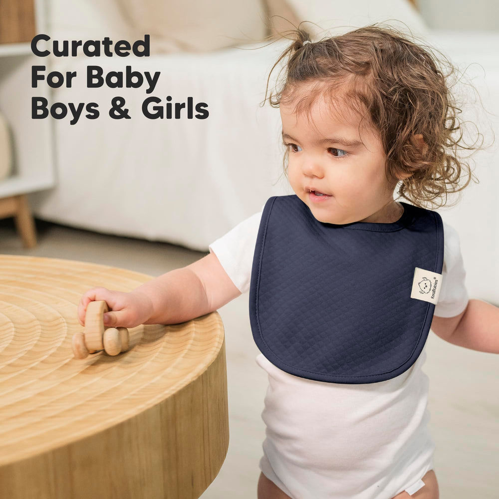 KeaBabies Urban Quin bib size coverage illustrated on a toddler torso.