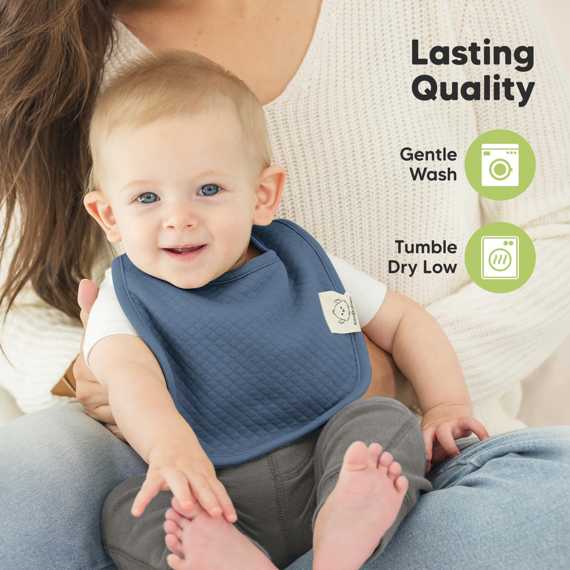 KeaBabies Urban Quin bib worn by a baby during feeding and drool moments.