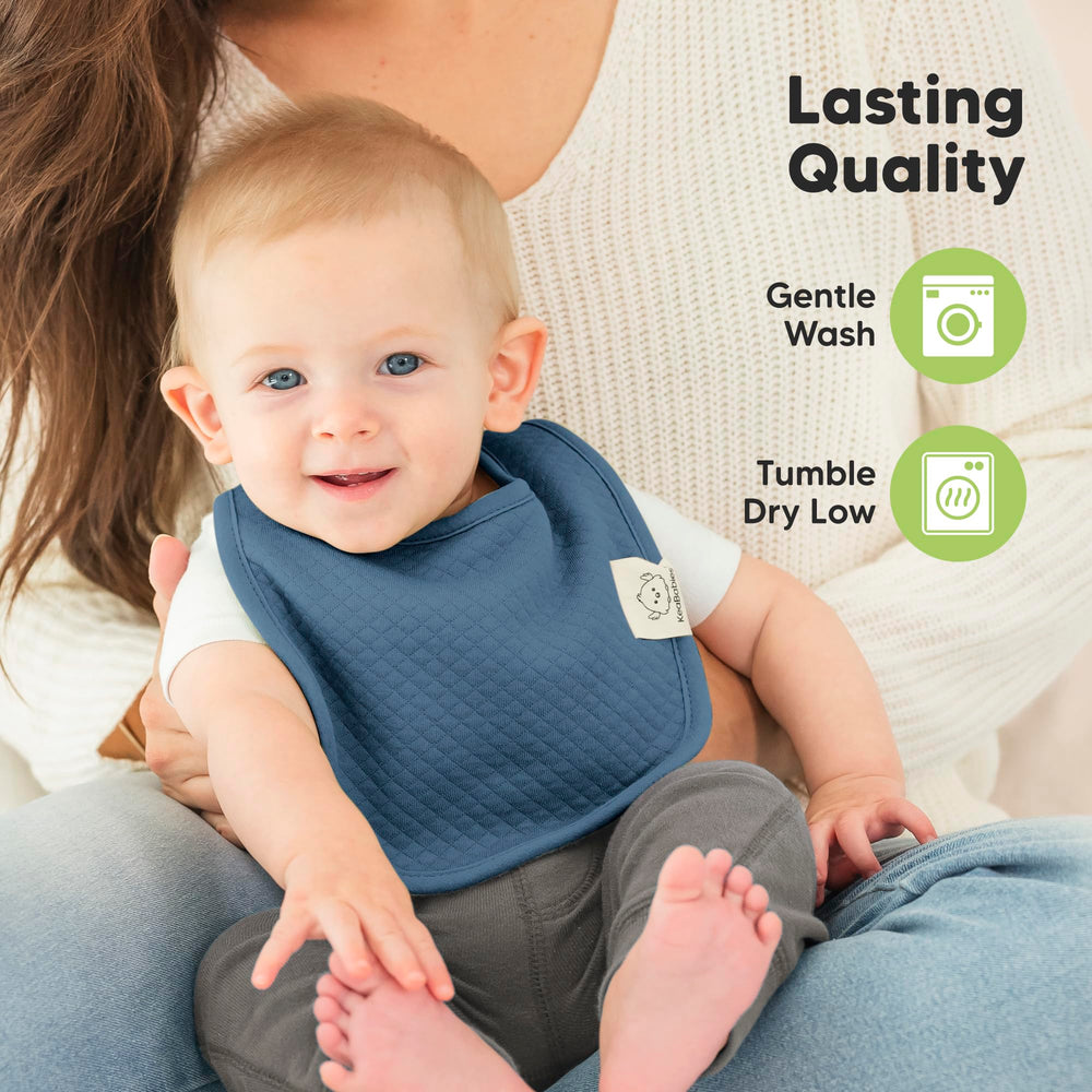 KeaBabies Urban Quin bib worn by a baby during feeding and drool moments.