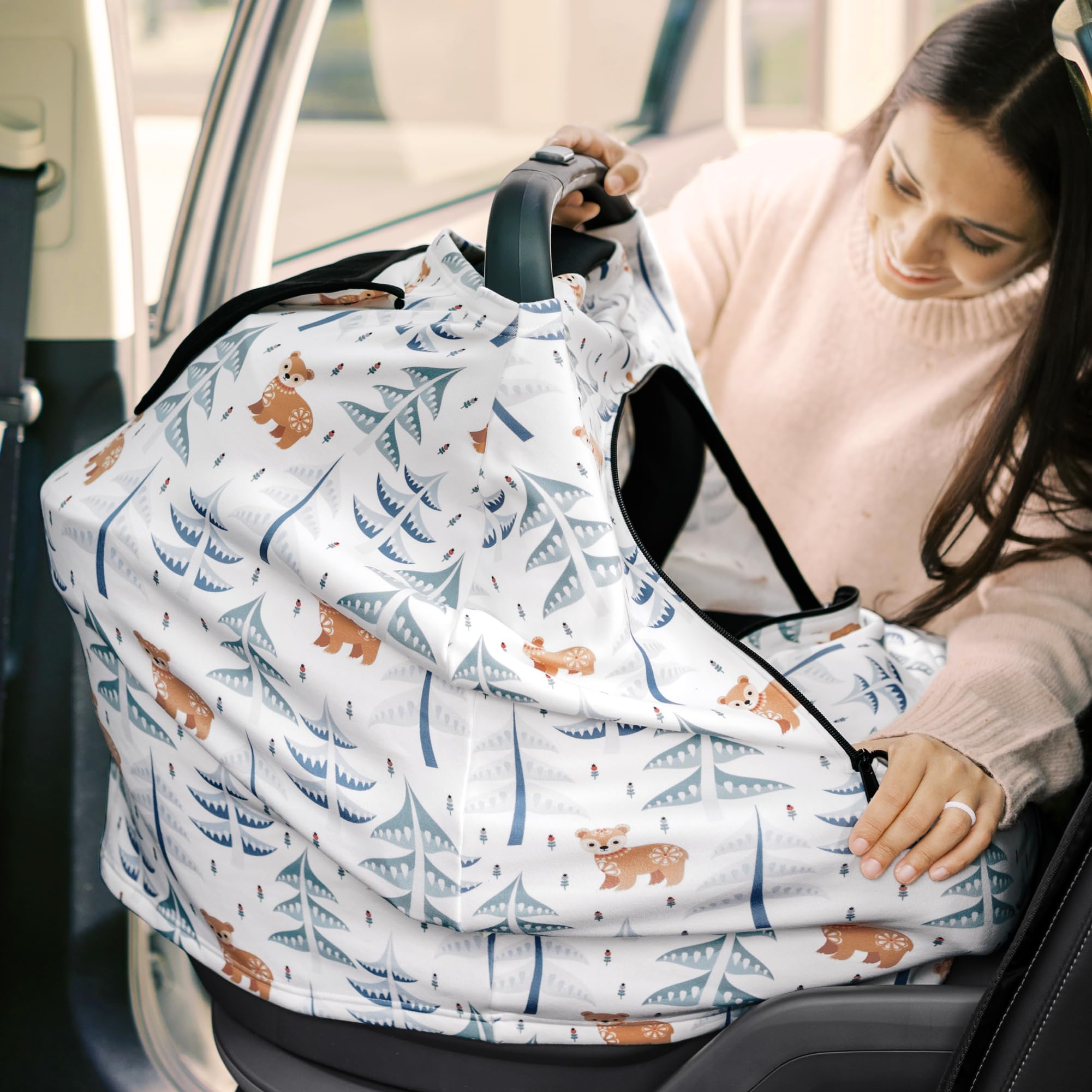 KeaBabies Warmzy travel-friendly canopy supports convenient nursing and shade on outings.