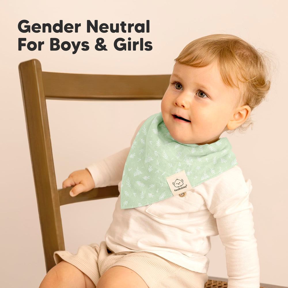 KeaBabies Lumi Muslin Bibs paired with outfits for boys and girls.
