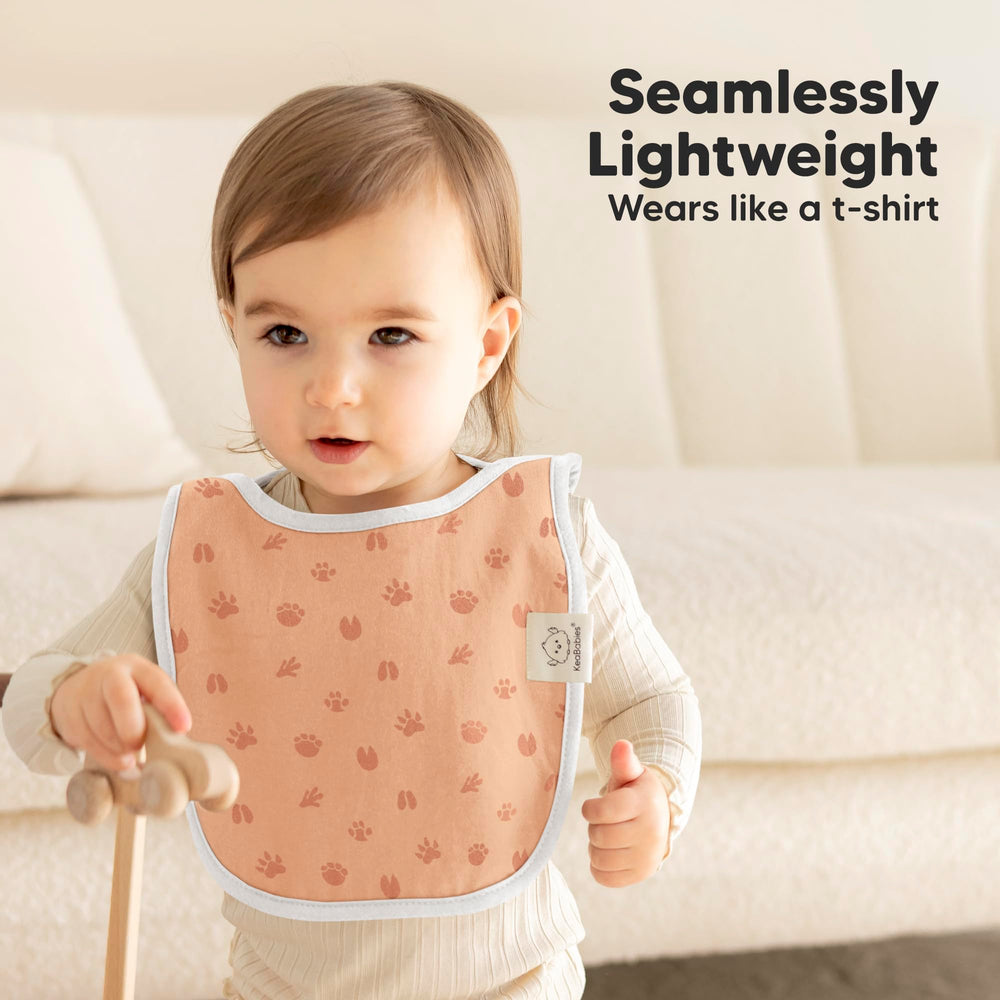 KeaBabies Wilderness bib full-body-fit demonstrates generous torso coverage