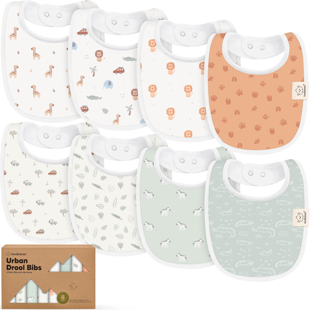 KeaBabies Wilderness bibs pack flatlay shows 8 unisex bibs for all-day mess management.