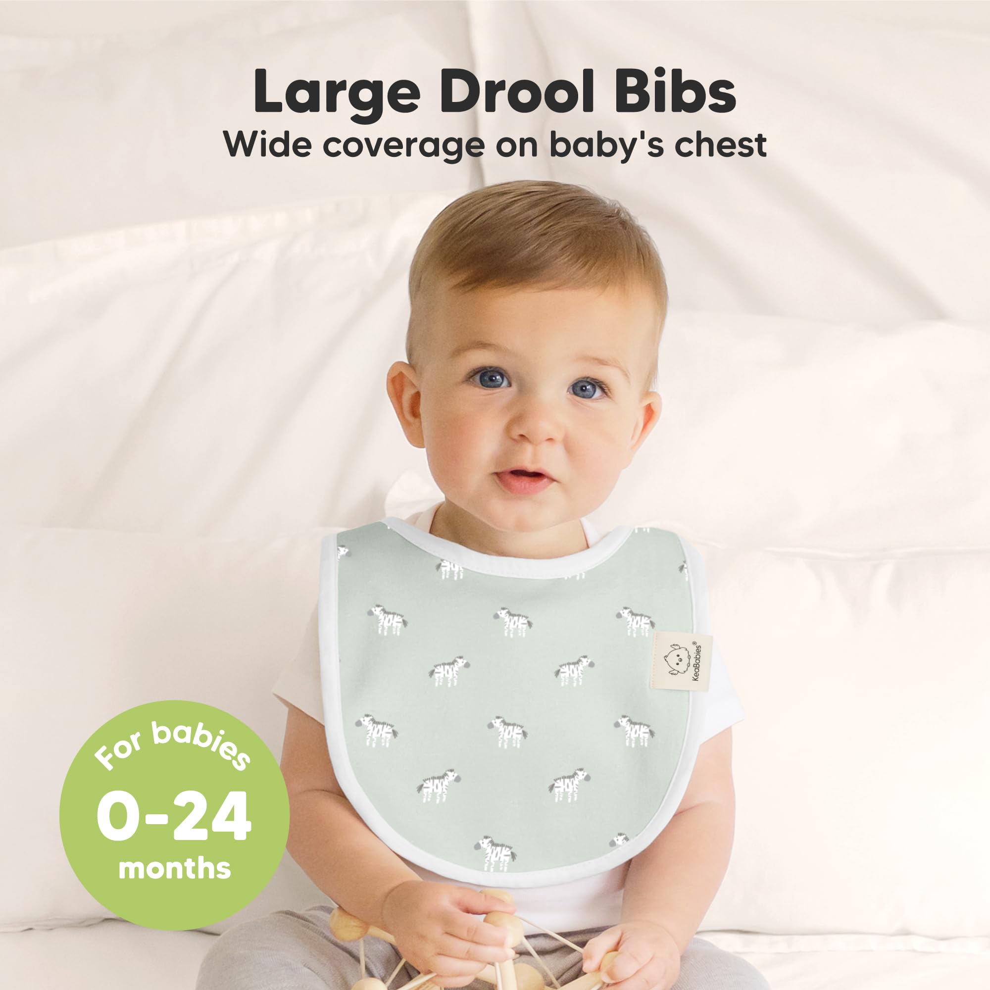 KeaBabies Wilderness bibs gift box flatlay emphasizes ready-for-gifting packaging and practicality.