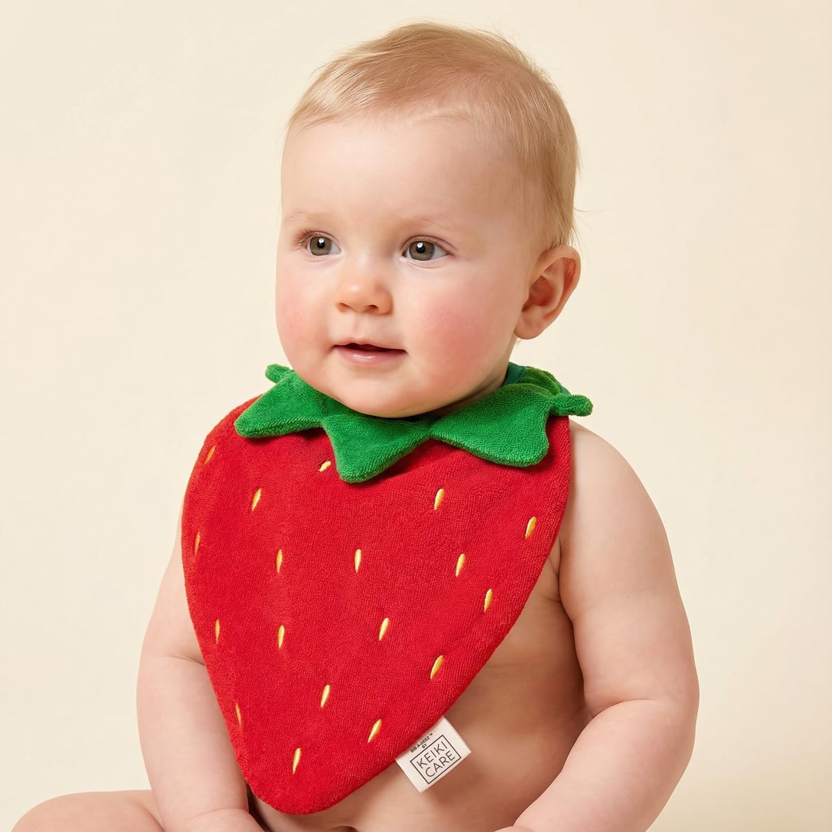 KEIKI CARE adjustable snaps on the bib provide a growing fit and secure comfort.