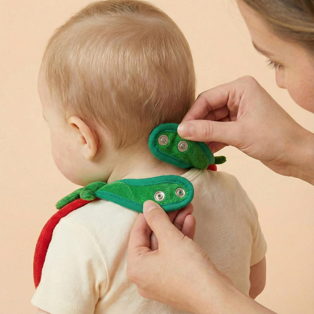 KEIKI CARE gift-ready strawberry bib is a thoughtful newborn or toddler gift.