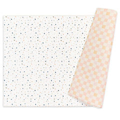 Keiki Care reversible play mat with thick padding for cushioned infant playtime.